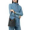 Borsa Donna a Spalla COCCINELLE Linea Nikla Mini Colore Cognac - Nero