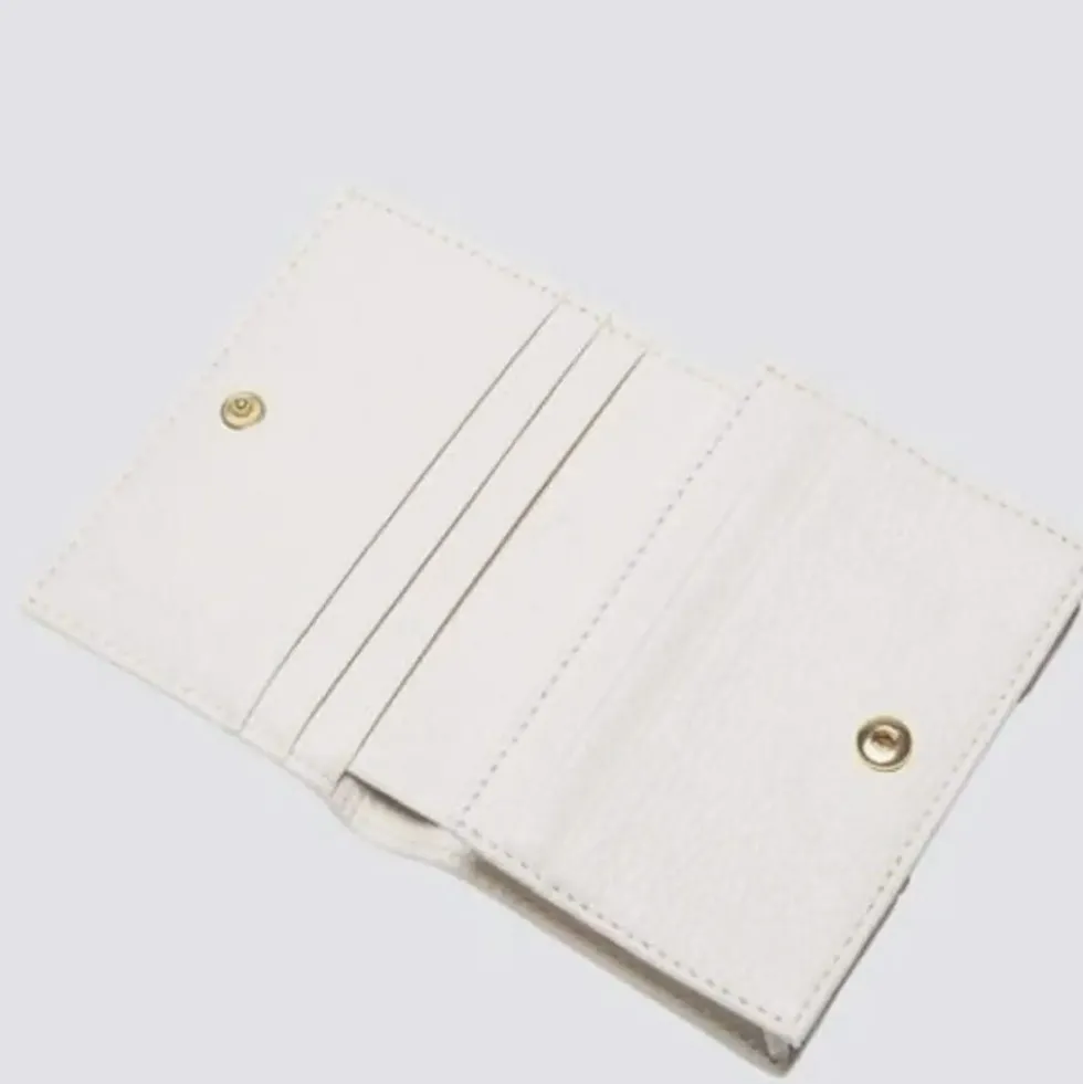Portafoglio Donna Mini COCCINELLE in Pelle Linea Metallic Soft colore Blanco Chiuso con Bottone